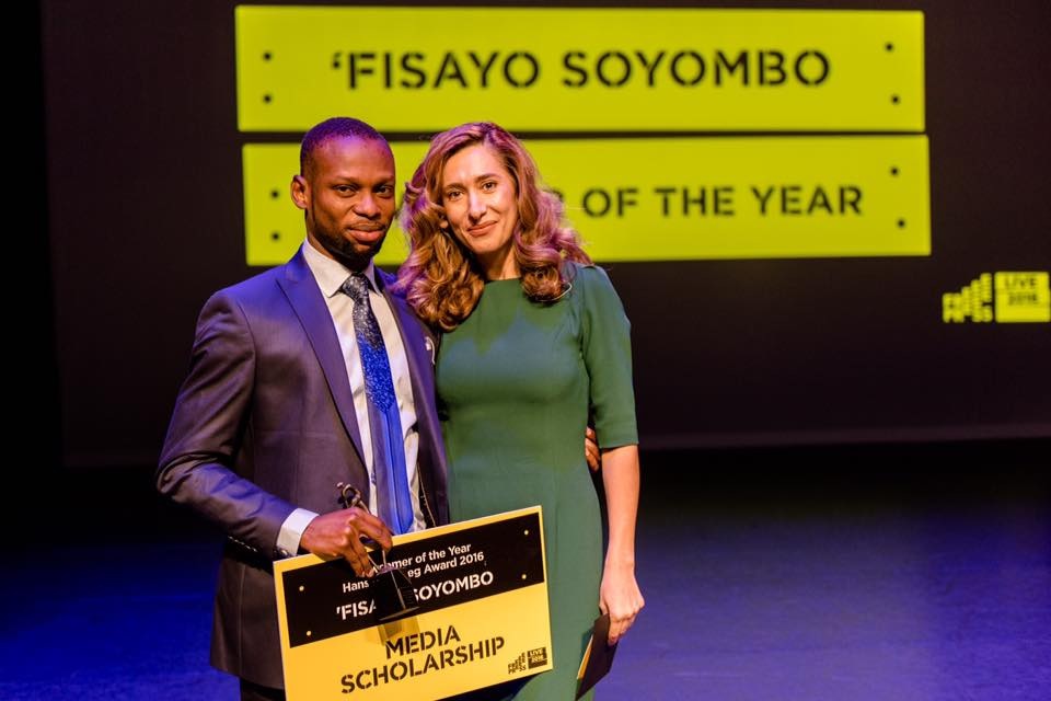 Soyombo receiving the award 